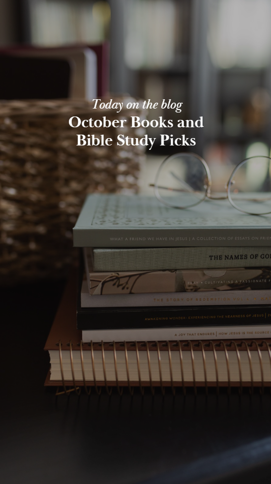 Multiple Daily Grace Bible studies with a pair of glasses on the stack