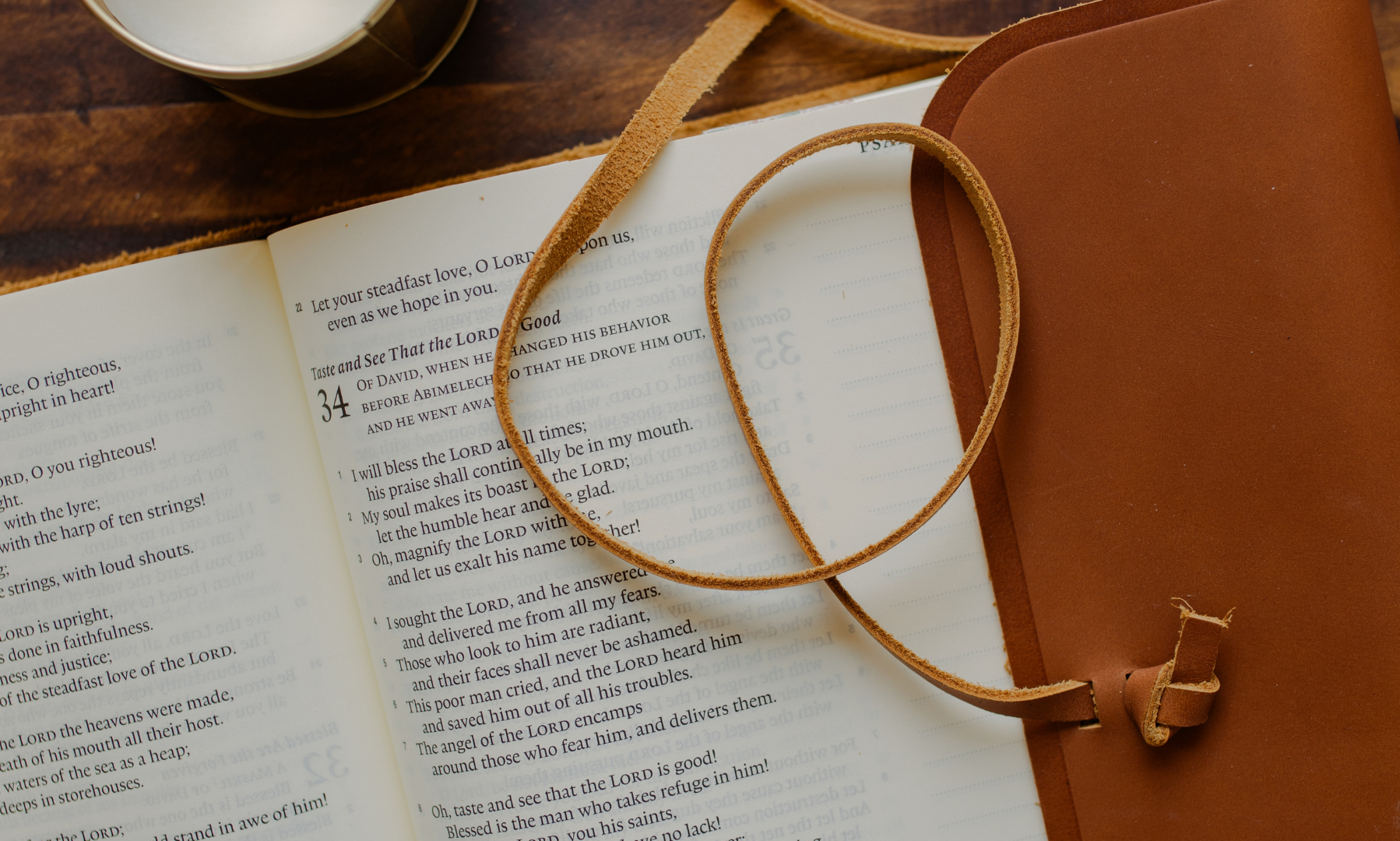 A leather wrapped bible with the tassel resting on the pages