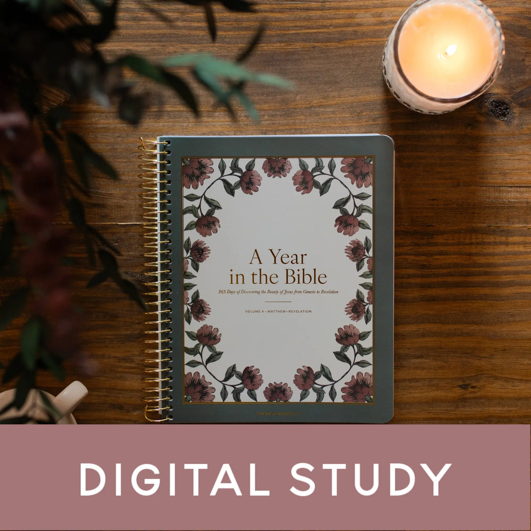 A Year in the Bible Vol 4 cover next to a lit candle on a wooden table with a label that says Digital Study