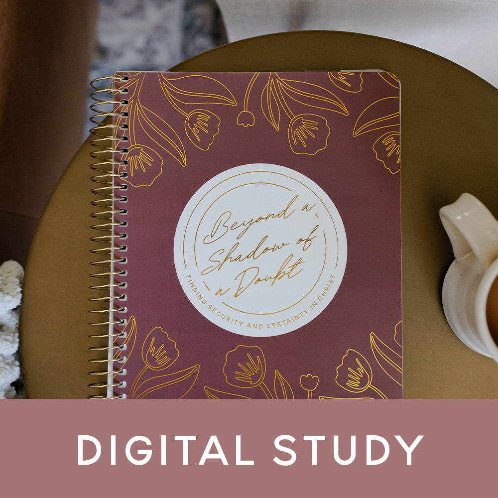 A bible study sitting on a table next to a coffee mug with the banner that says Digital Study on it.