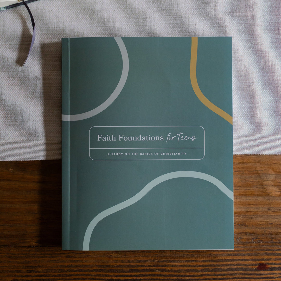 Faith Foundations for Teens Bible study laying on a table