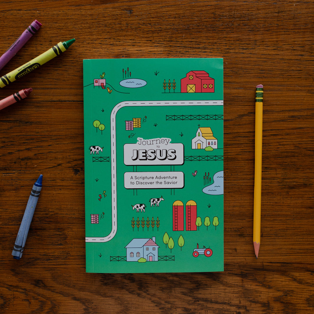 Journey to Jesus Lent Tween resource laying on a table with crayons.