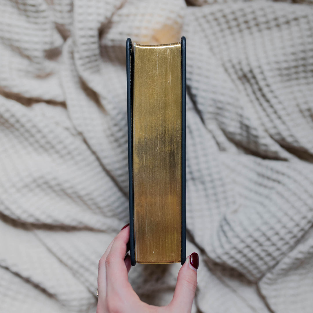 Navy blue ESV Bible with gold page edges