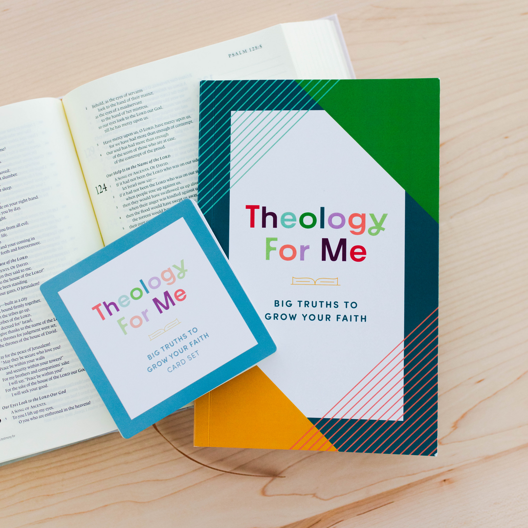 Kid's card set and booklet laying on top of Bible