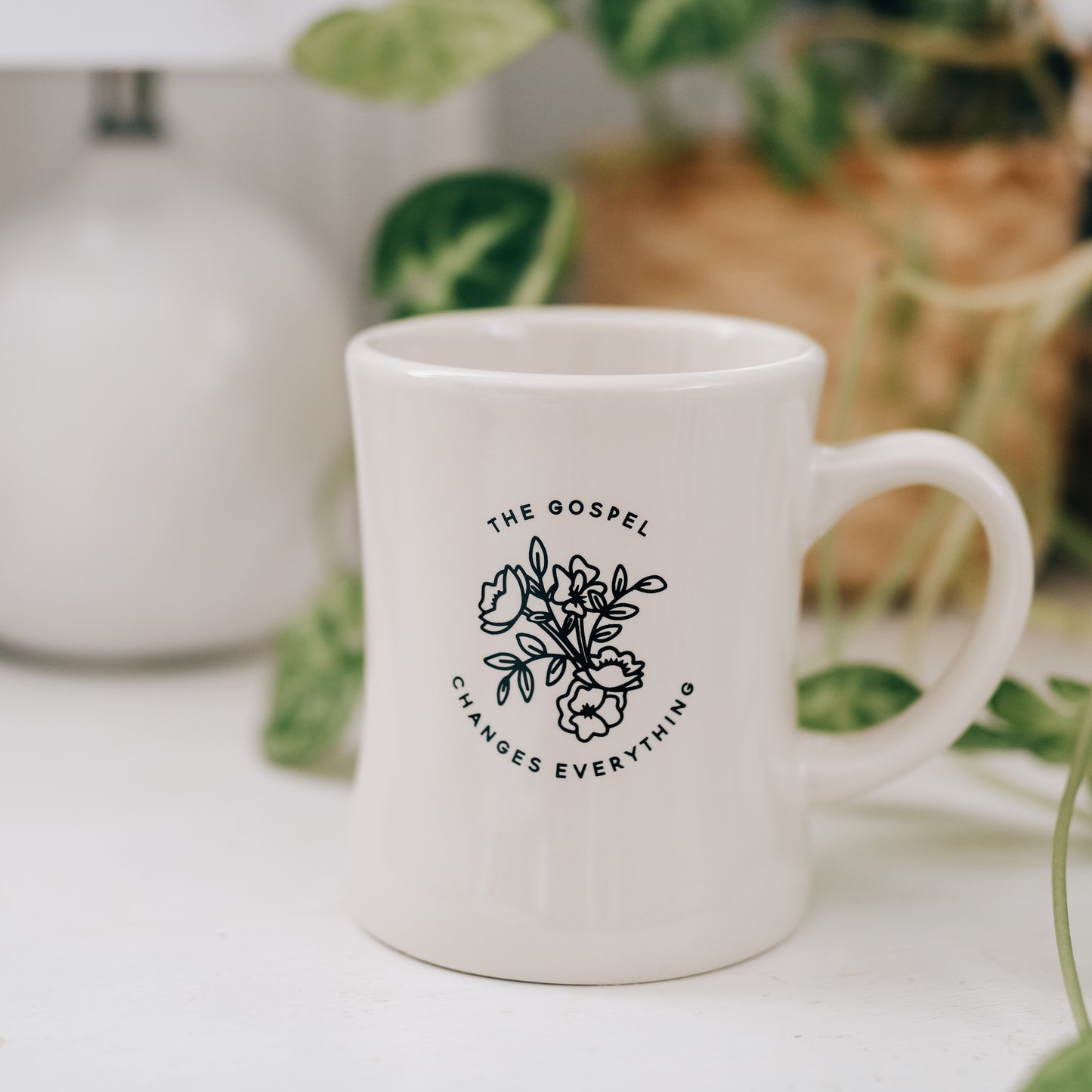 The Gospel Changes Everything Cafe Mug