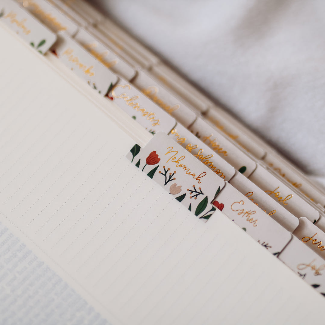 Floral Bible tabs with a script.