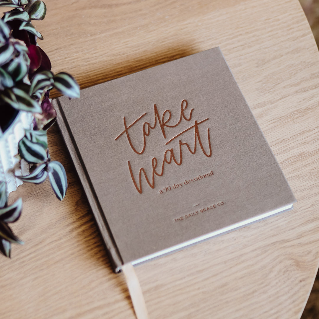 Cover photo of Devotional book closed on a table