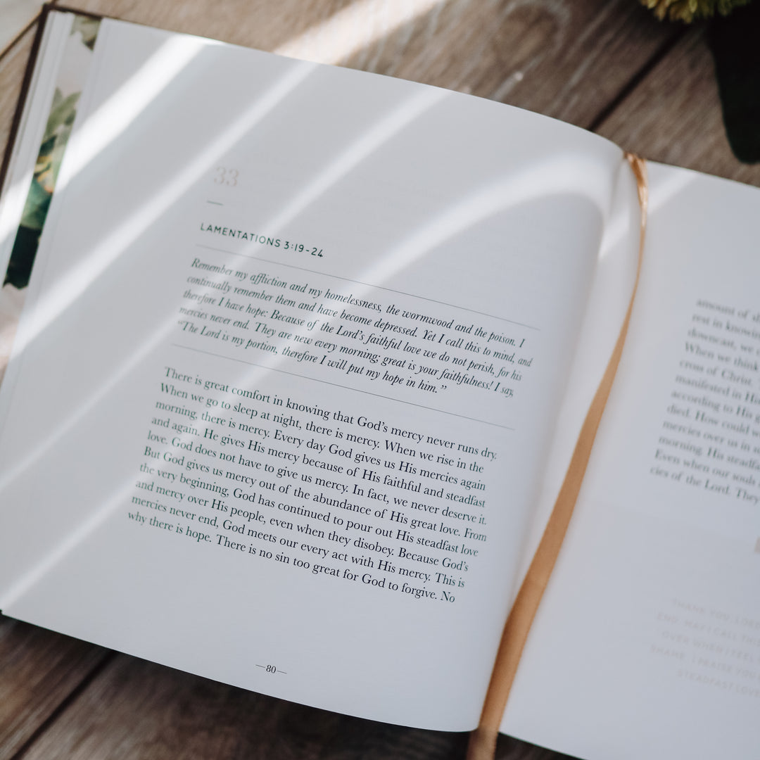 Devotional book open to a page on Lamentations