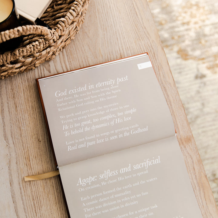 devotional opened to writing on a table