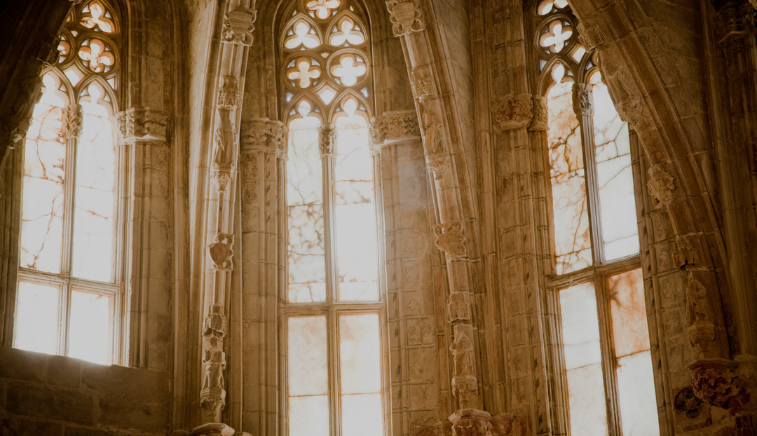 The interior walls of a church or chapel building with detailed sculptings