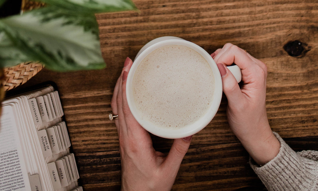 Picture of a cup of coffee and a Bible.