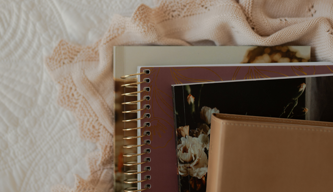 Stack of multiple studies on white blankets