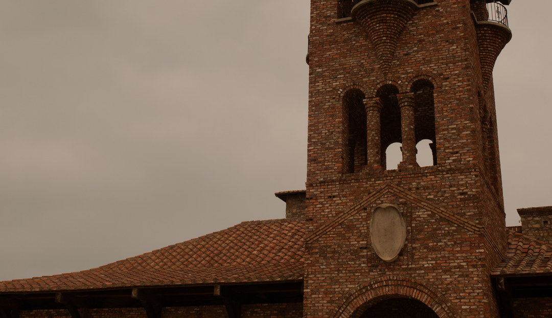 Up close of a tower on top of a church chapel