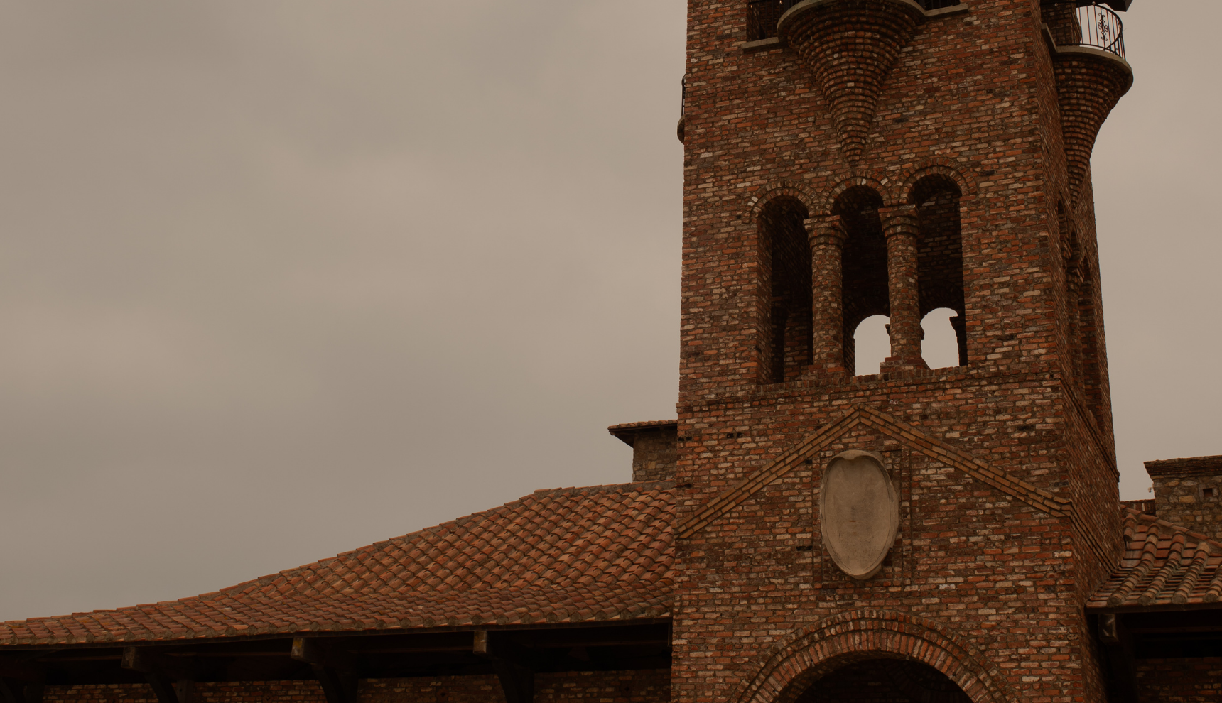 Up close of a tower on top of a church chapel