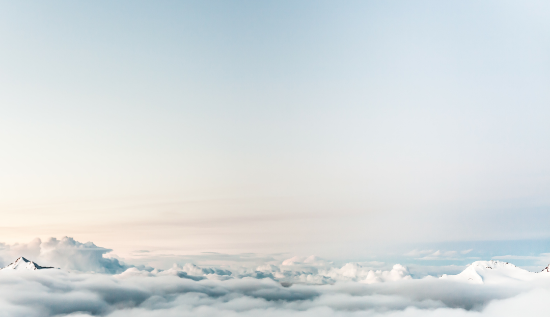 Space above the clouds showing a clear and blue sky