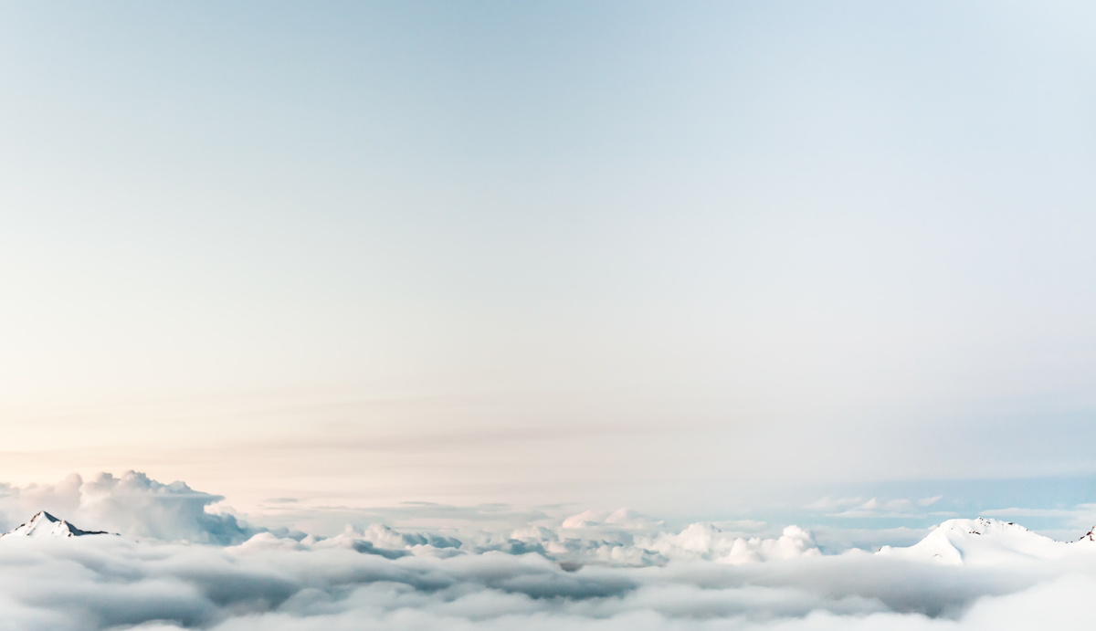 Space above the clouds showing a clear and blue sky