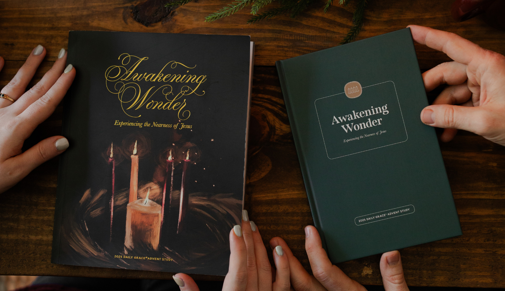 Both of the Awakening Wonder studies side by side to each other on a wooden table