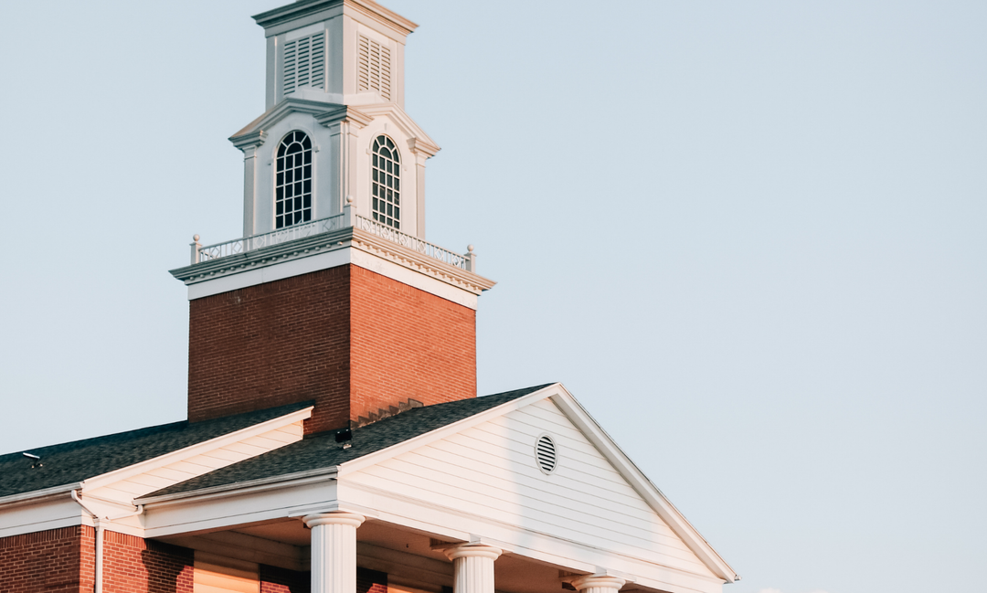A church chapel overlooking a clear sky