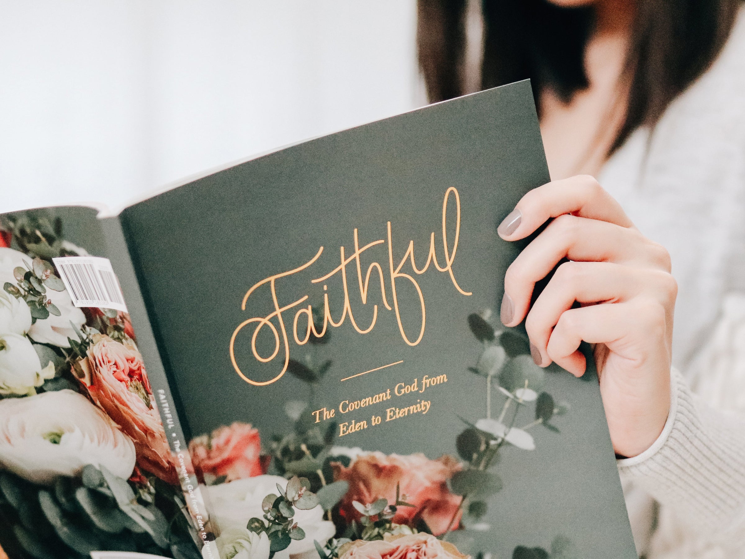 woman holding Bible study