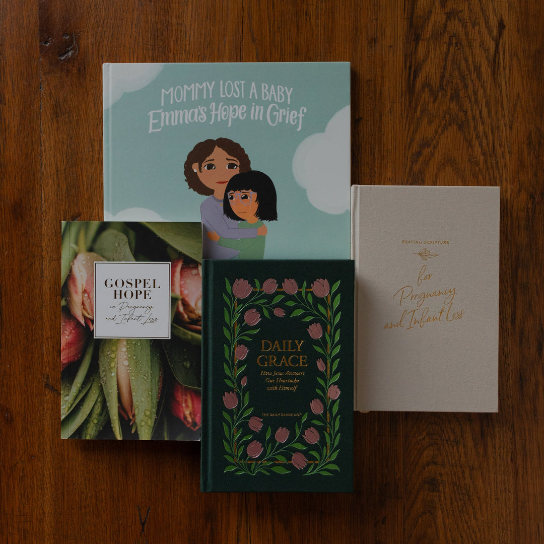 The Grief and Loss Bundle on a wooden table