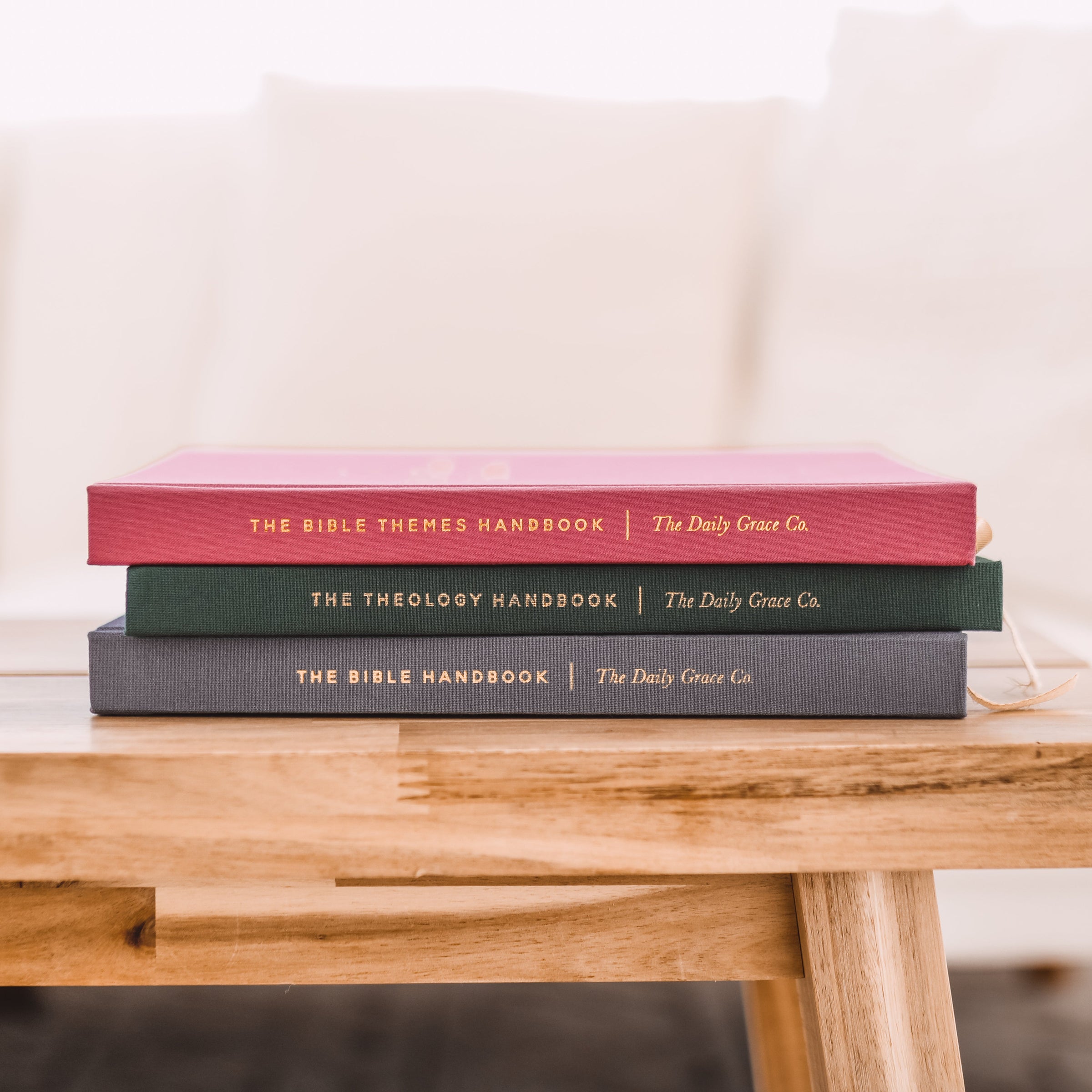 Stack of Bible Reference books on table