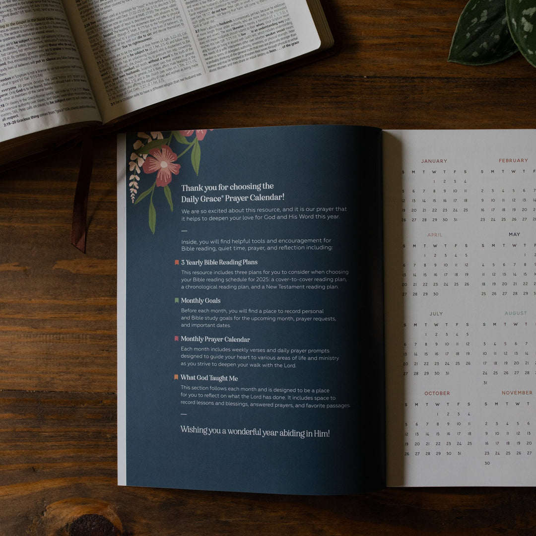 Opening page with information on what is included inside the calendar open on a table with a Bible 