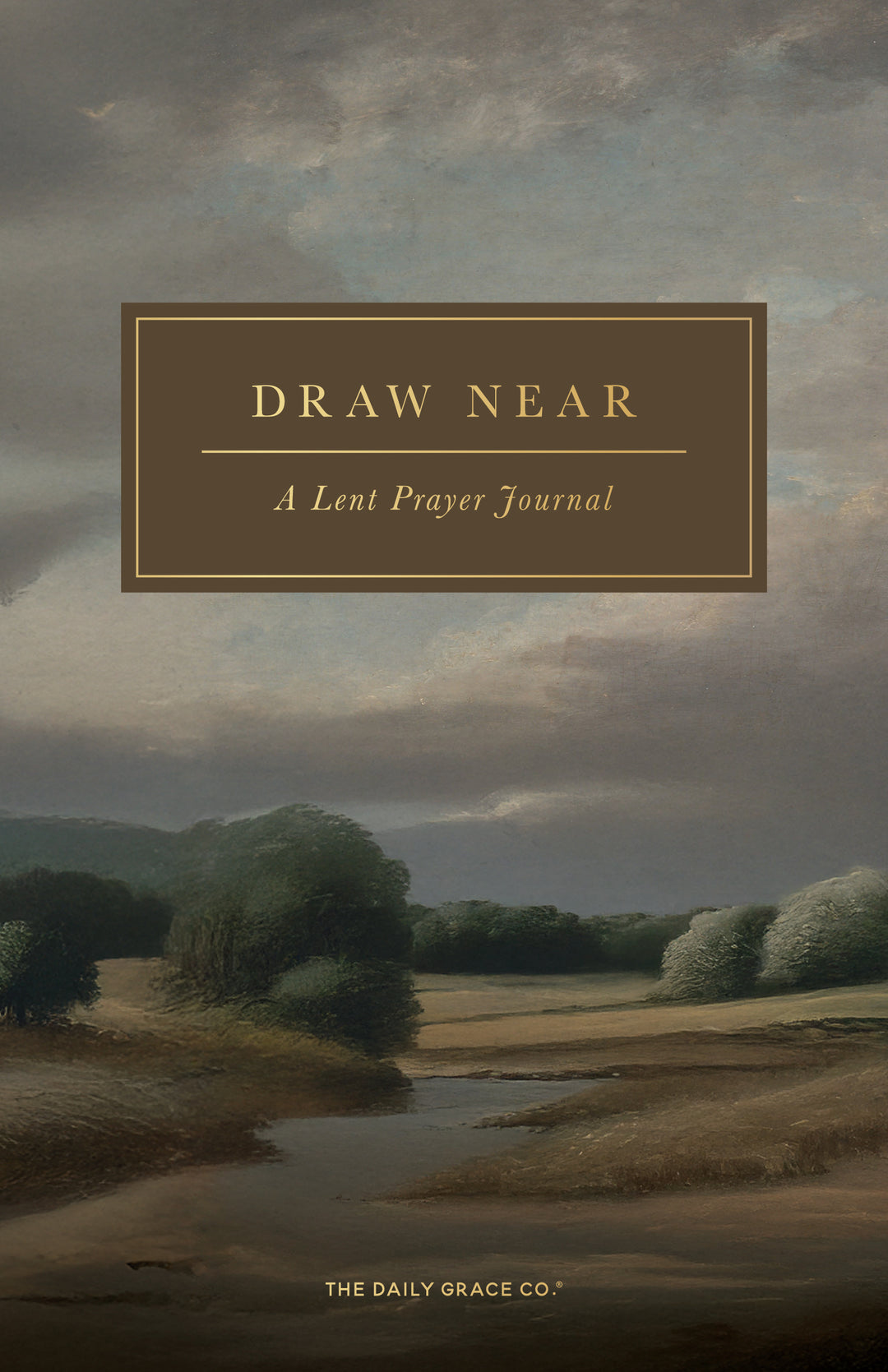 Front cover of the book 'Draw Near: A Lent Prayer Journal' by The Daily Grace Co., featuring a muted landscape painting with a cloudy sky, trees, and a stream, with a brown title box overlaid near the top.
