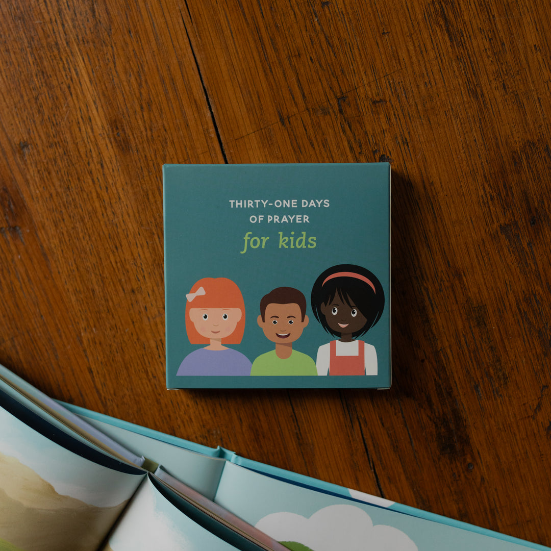 The 31 Days of Prayer for Kids Verse Cards Box on a wooden table