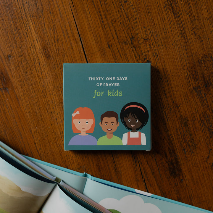 The 31 Days of Prayer for Kids Verse Cards Box on a wooden table