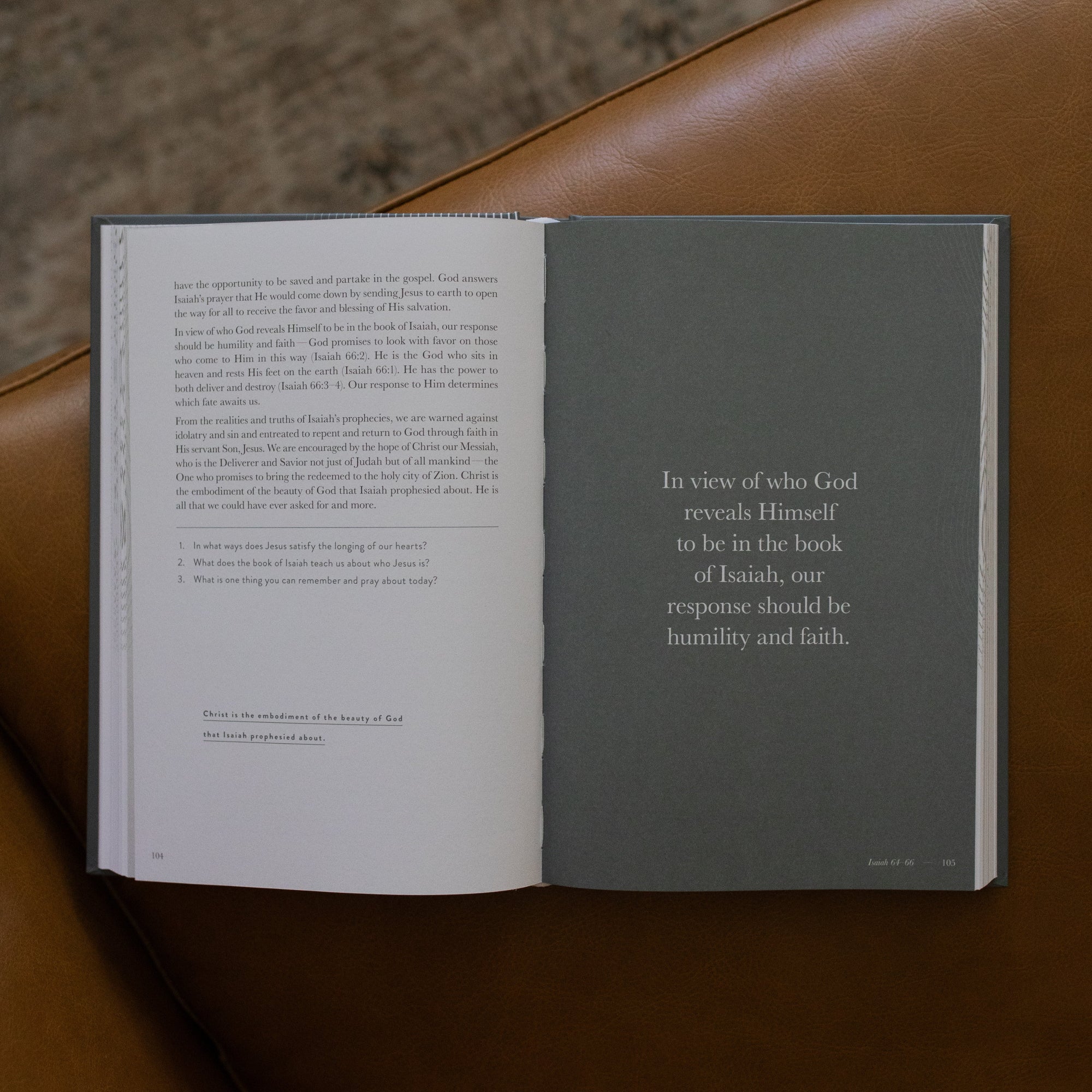 A Year in the bible Vol 3 opened to page 104 on a leather couch