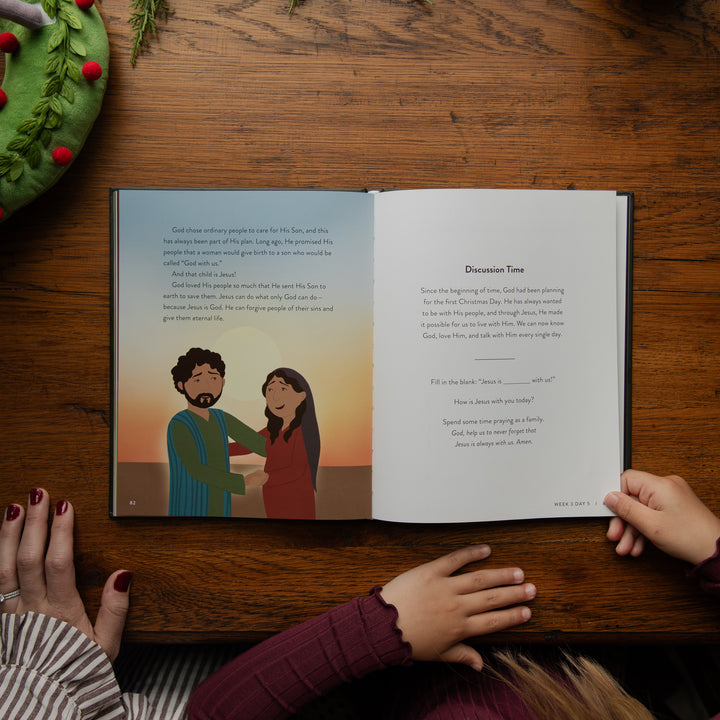 An open children's Bible book displayed on a wooden table, with two children's hands holding the pages and another hand resting nearby. The left page features a colorful illustration of a man and a woman, while the right page contains text under the heading 'Discipline Time.