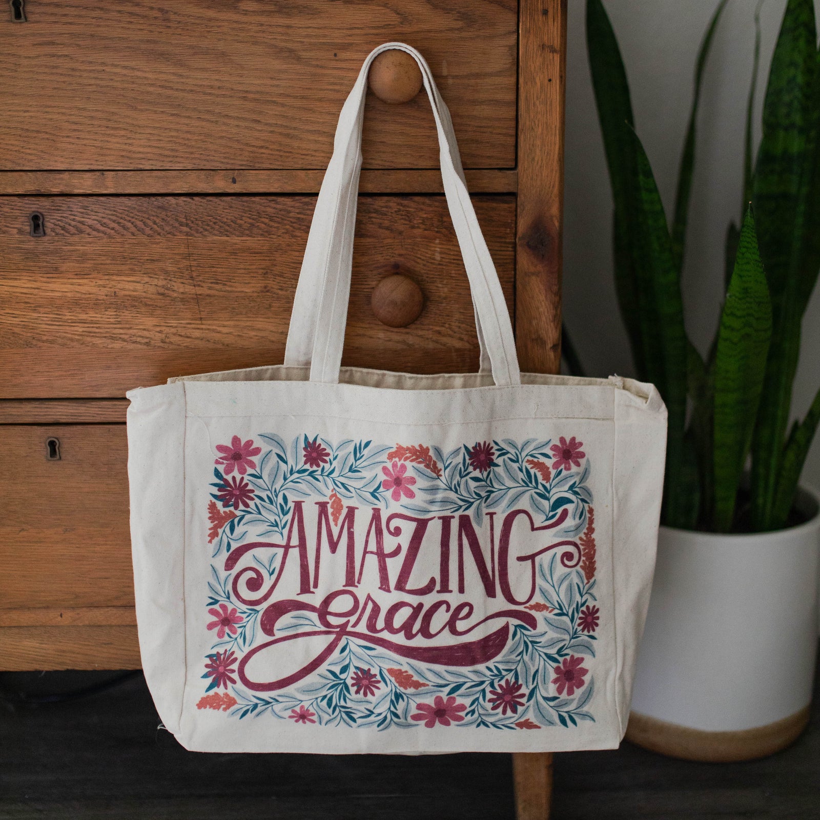 Printed tote that reads "Amazing Grace" with colorful florals