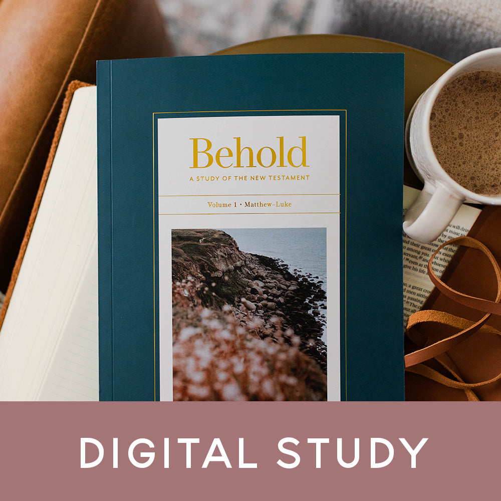 Behold Bible studies laying on a bed next to a coffee mug and Digital Studies banner on the photo.