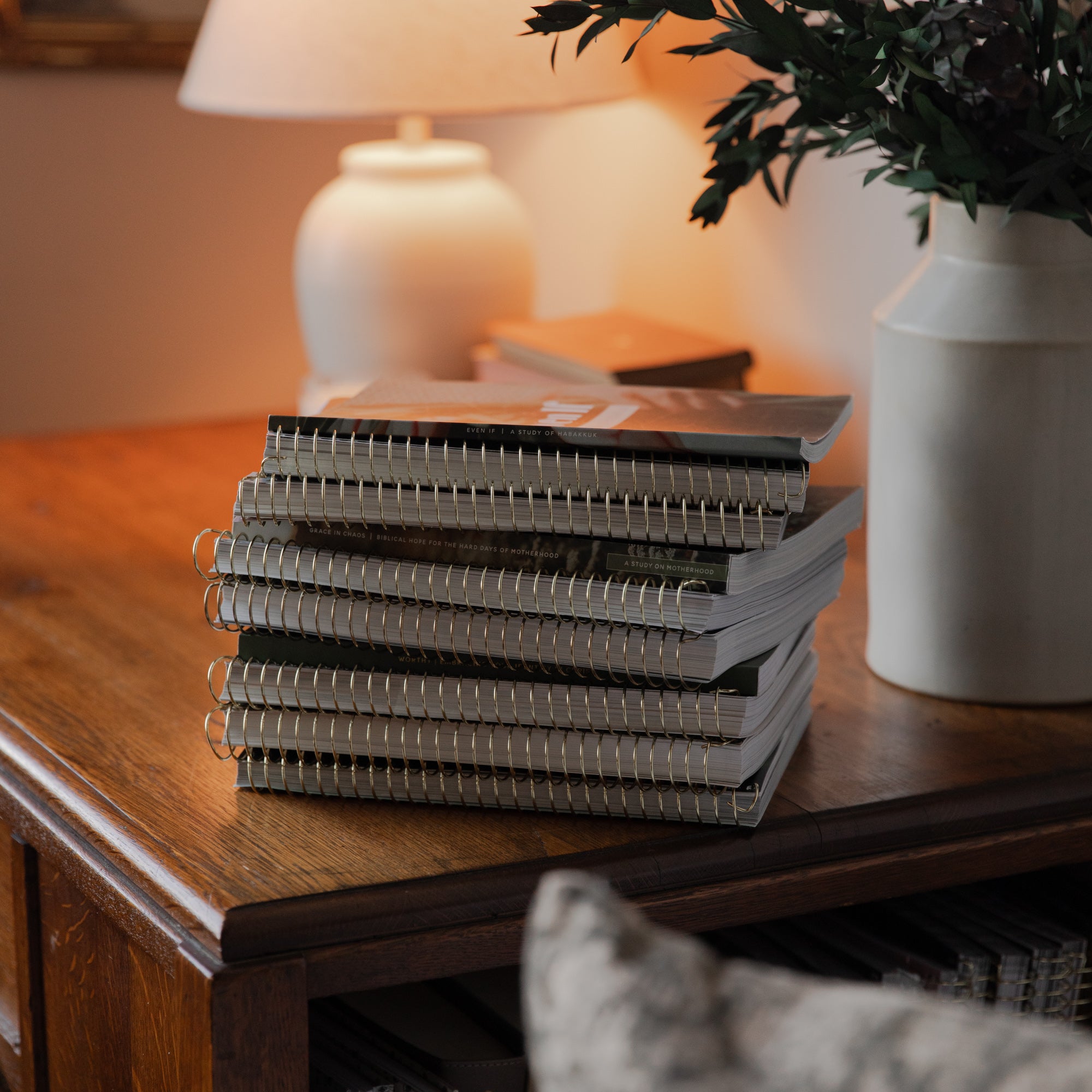 Multiple spirals stacked on a wooden table