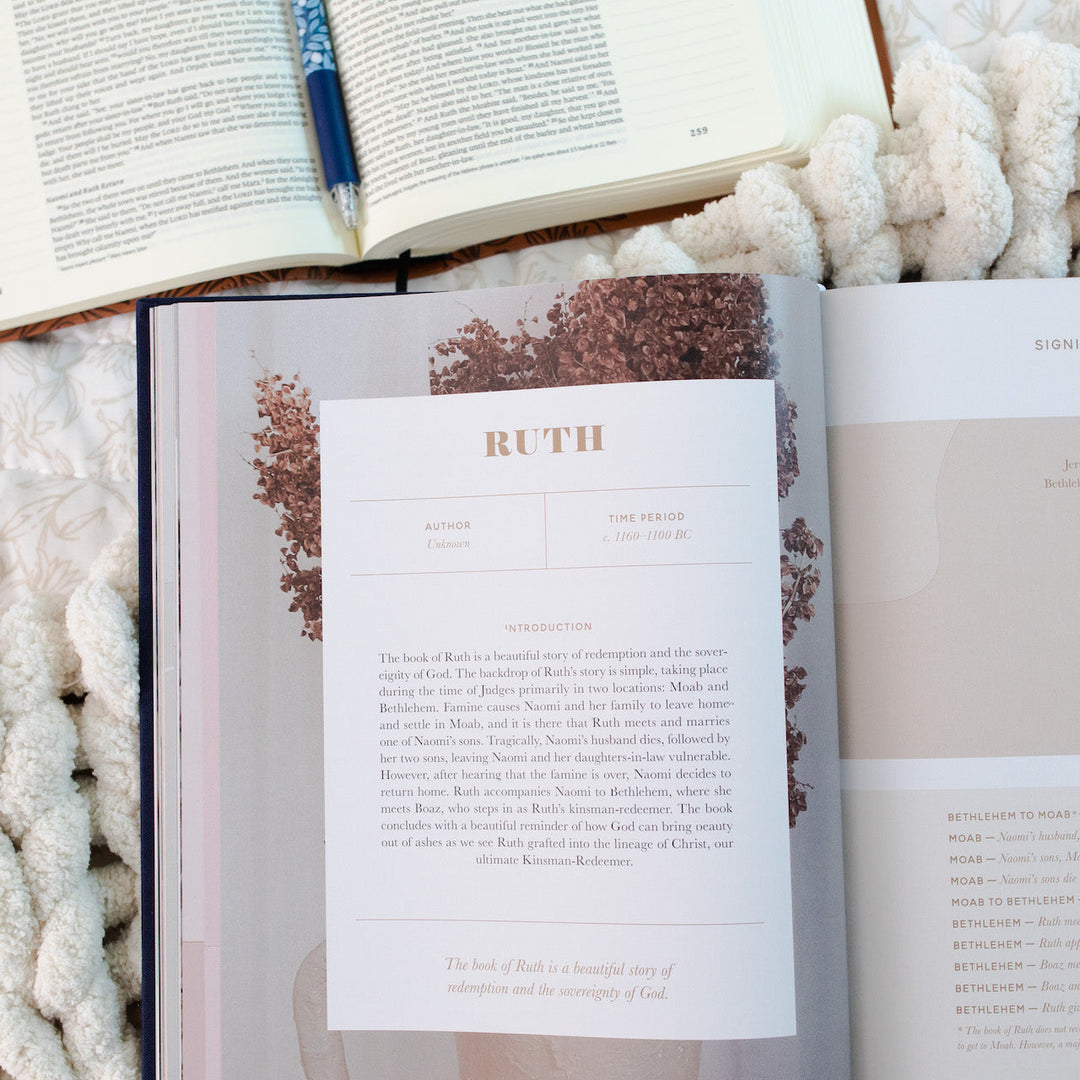 Handbook open to page of information with Bible and pen next to it