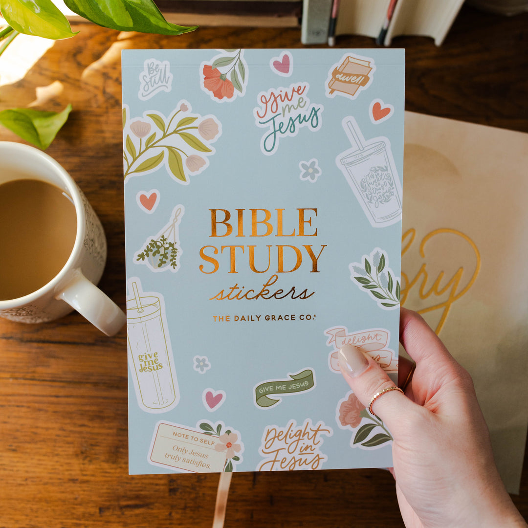 women holding Bible Study Stickers with bible