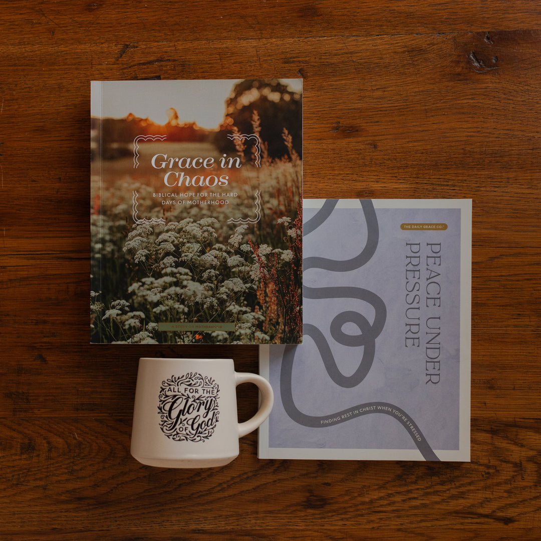 Peace under Pressure and the Grace in Chaos study and the Glory Stoneware Mug next to each other on a wooden desk