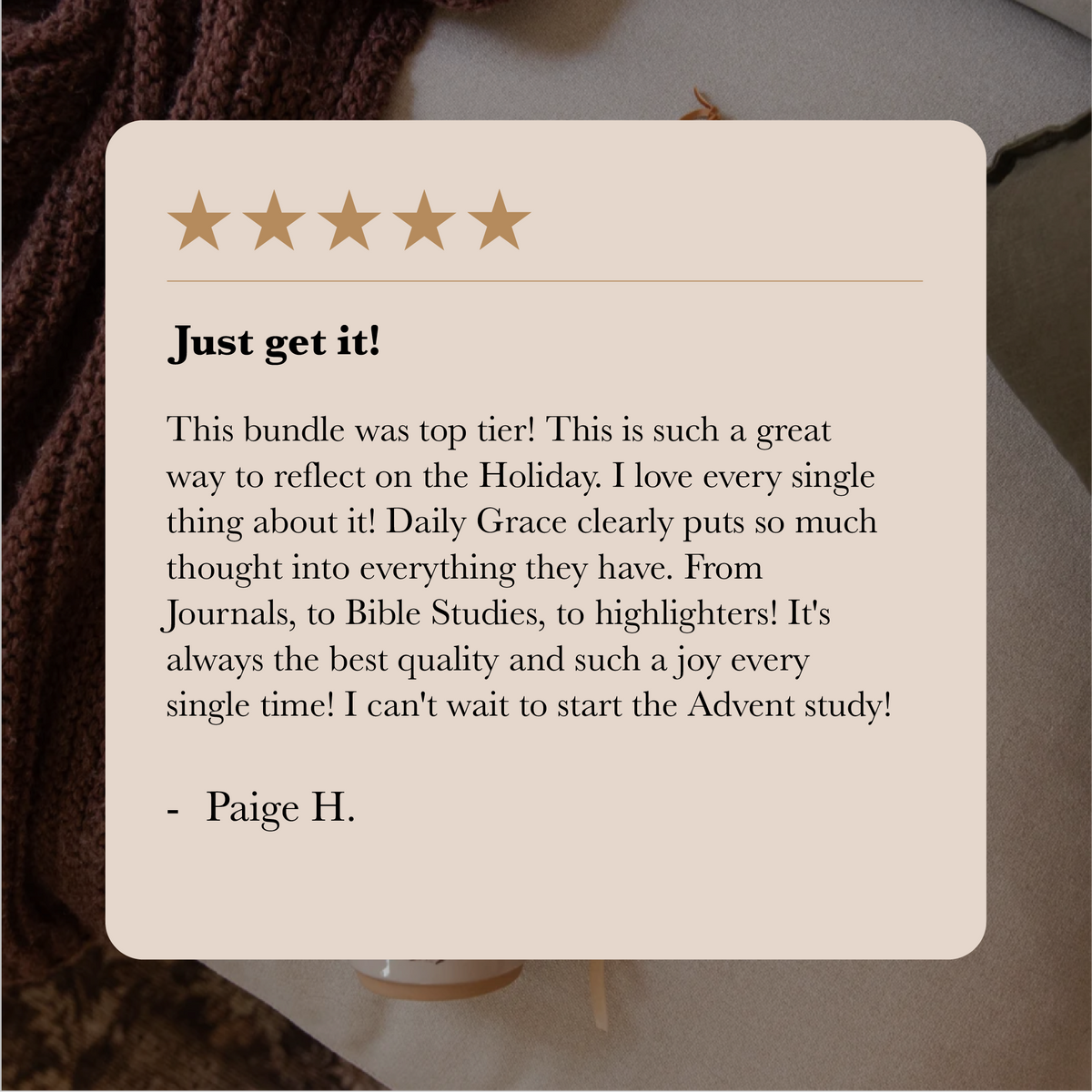A cream-colored card with a rounded corner displaying a customer review of 5 stars from Paige H. about an Advent study bundle, set against a cozy background of a brown knit sweater and a gray blanket.