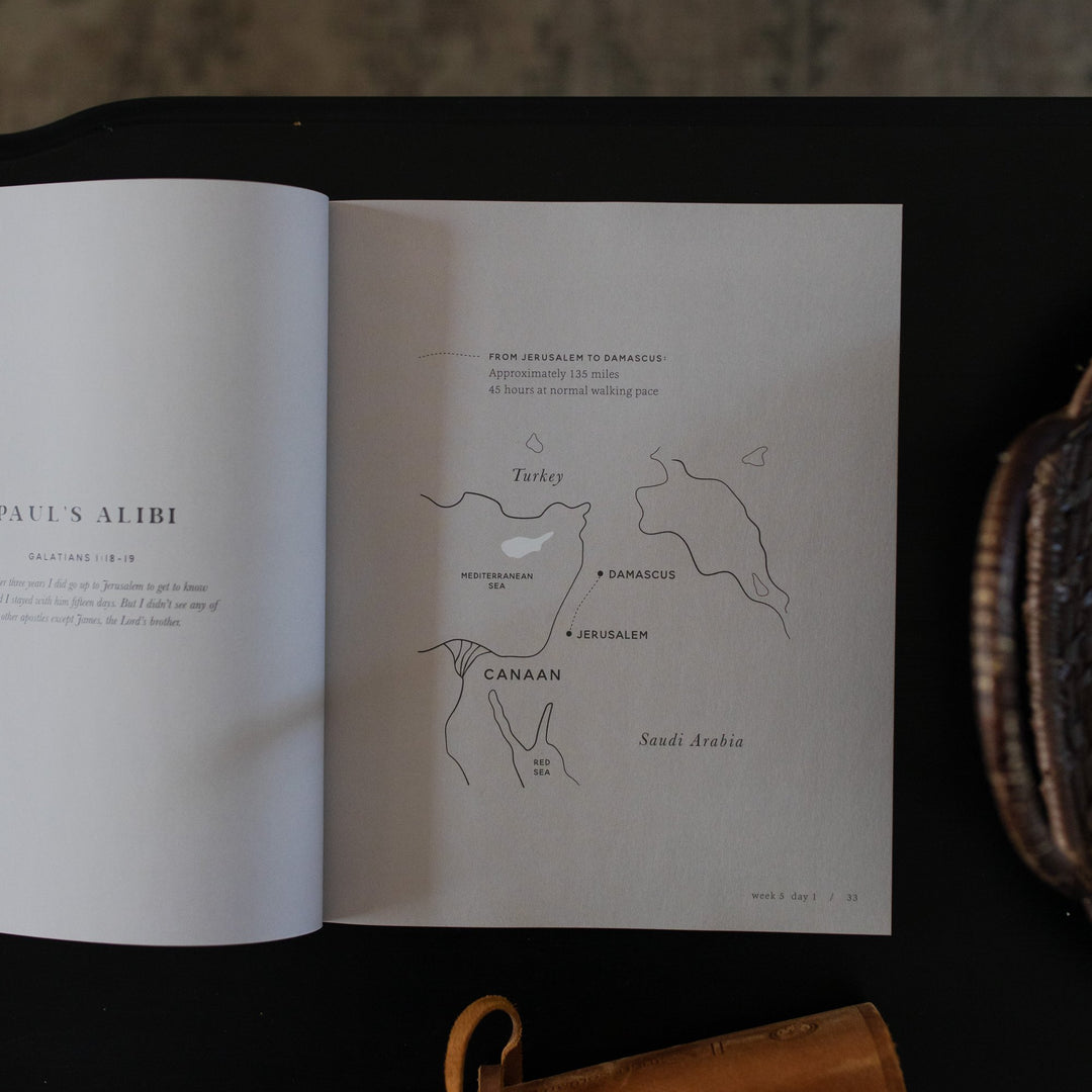 Map drawing from By Faith Bible study on the book of Galatians for men open on a table