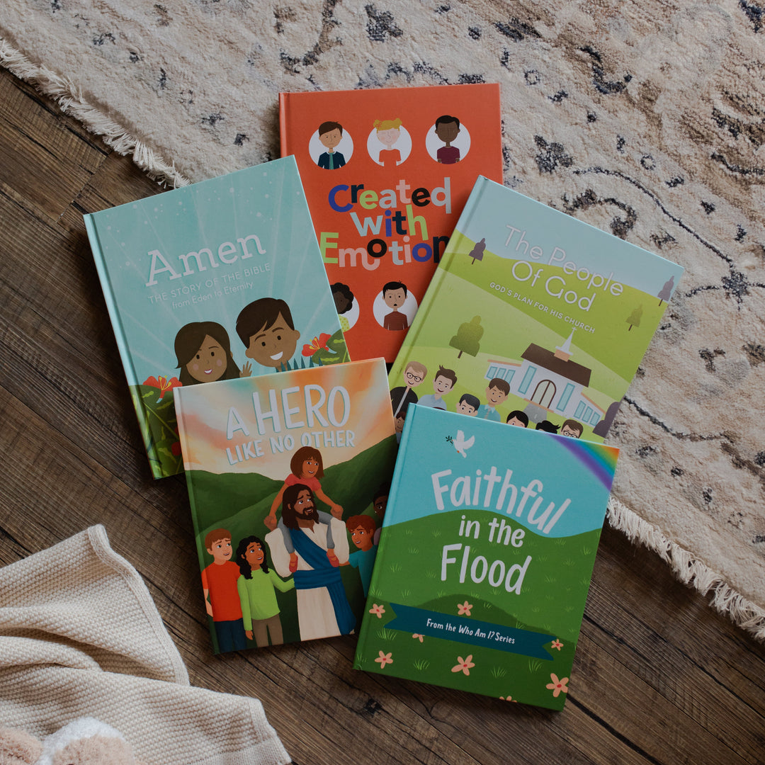 The Children's Book Bundle stacked on one another laying on the floor