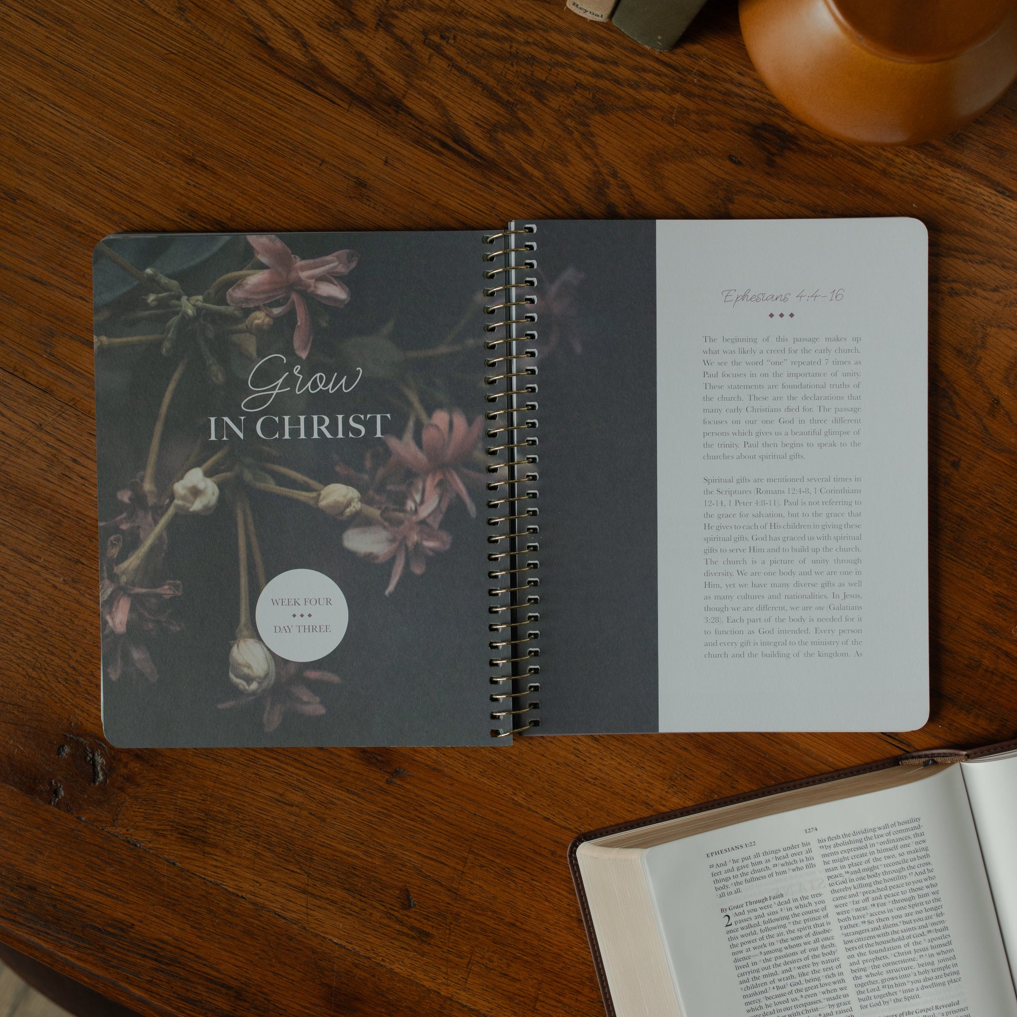 The Chosen study opened to Week four day three cover page on a wooden table with an open bible nearby