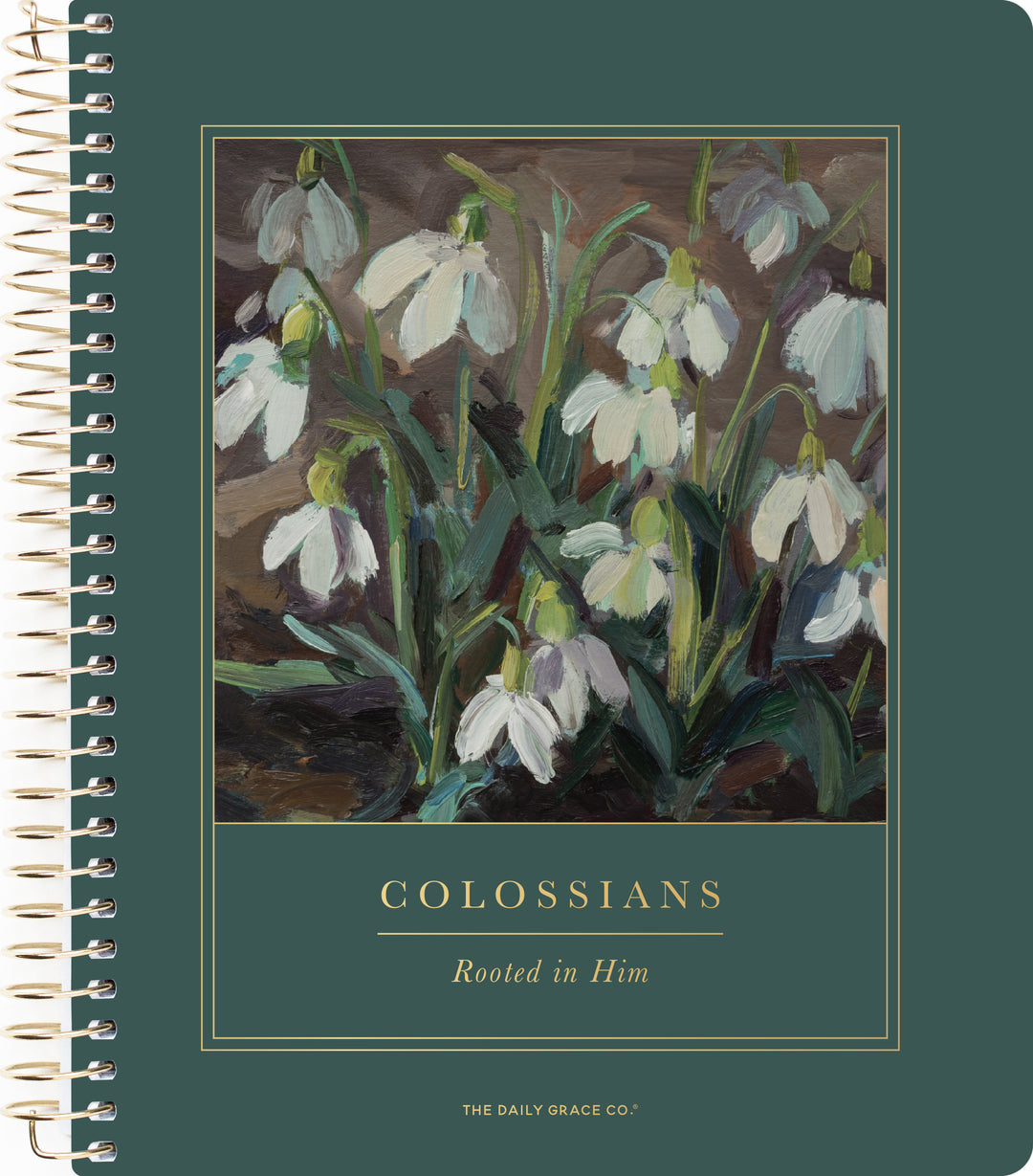 A green spiral with gold lettering and etching with a painting of slowly blooming flowers on the cover