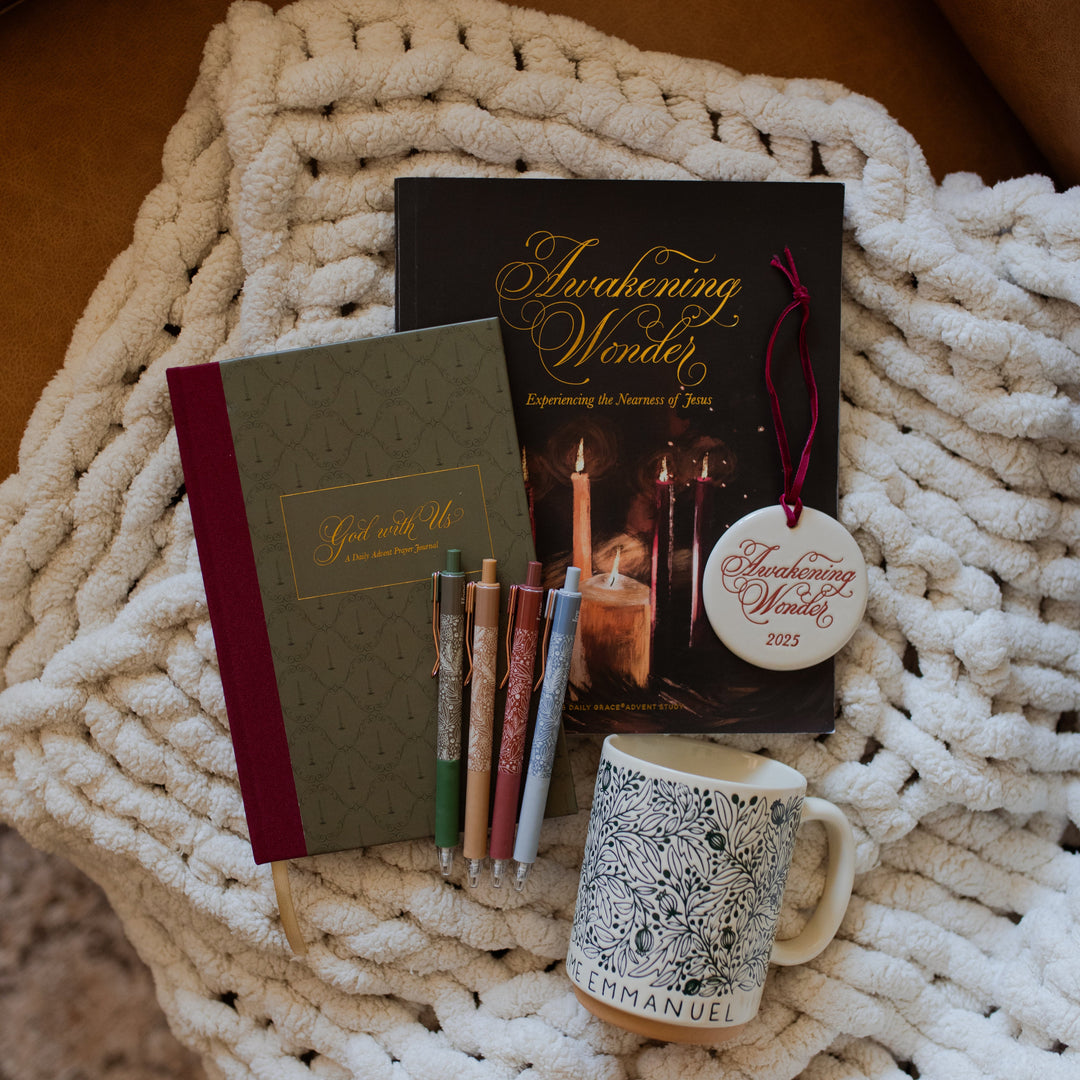 The Cozy Quiet Time Bundle with the Emmanuel Mug all laying on a white knitted blanket