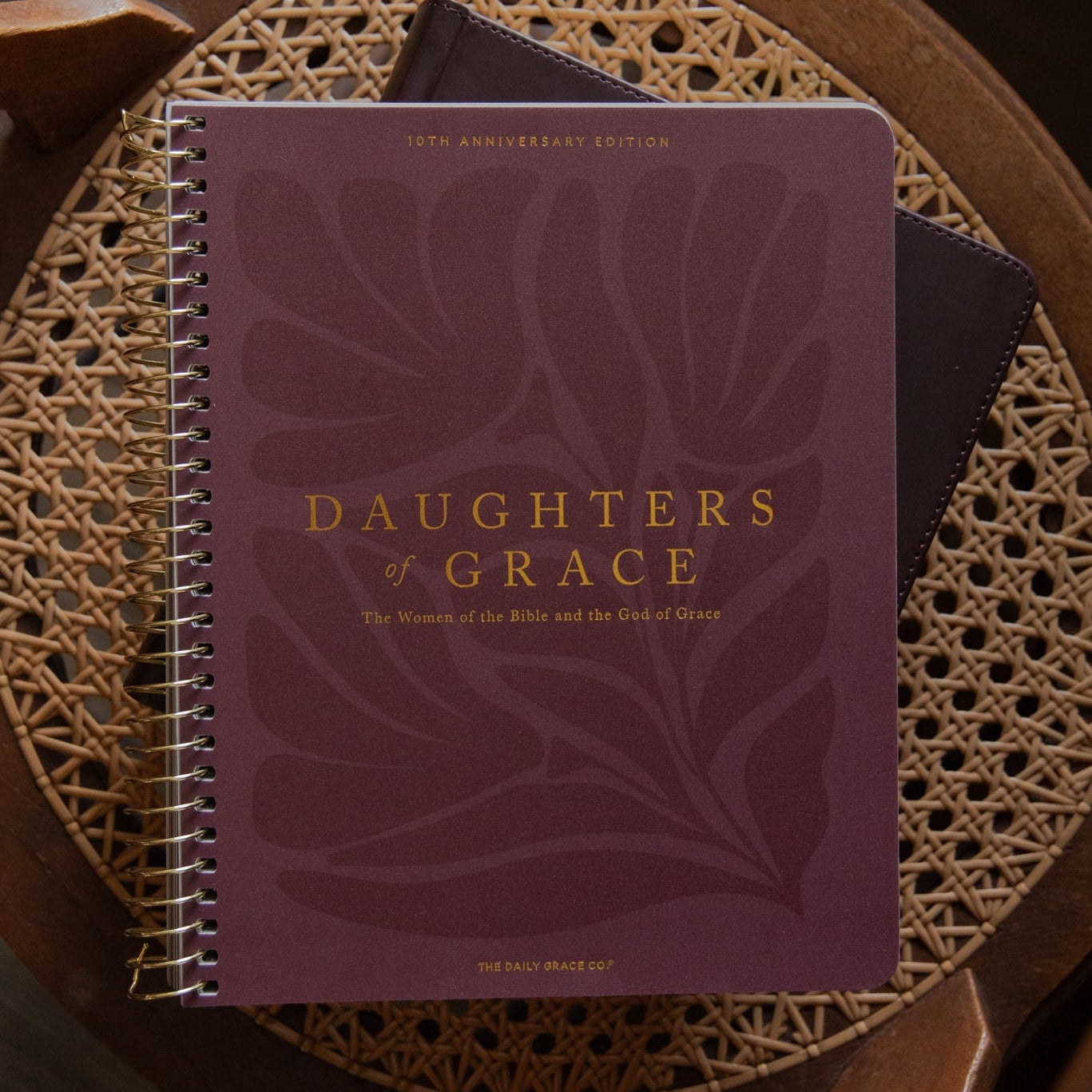 Purple Bible Study titled 'Daughters of Grace' on a wooden chair