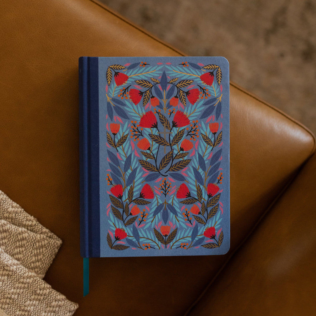 ESV Garden Bible cover on a leather couch