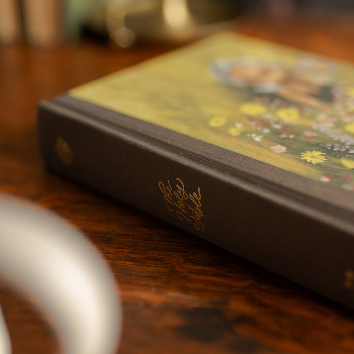 ESV journaling Fields Bible spine on a wooden table