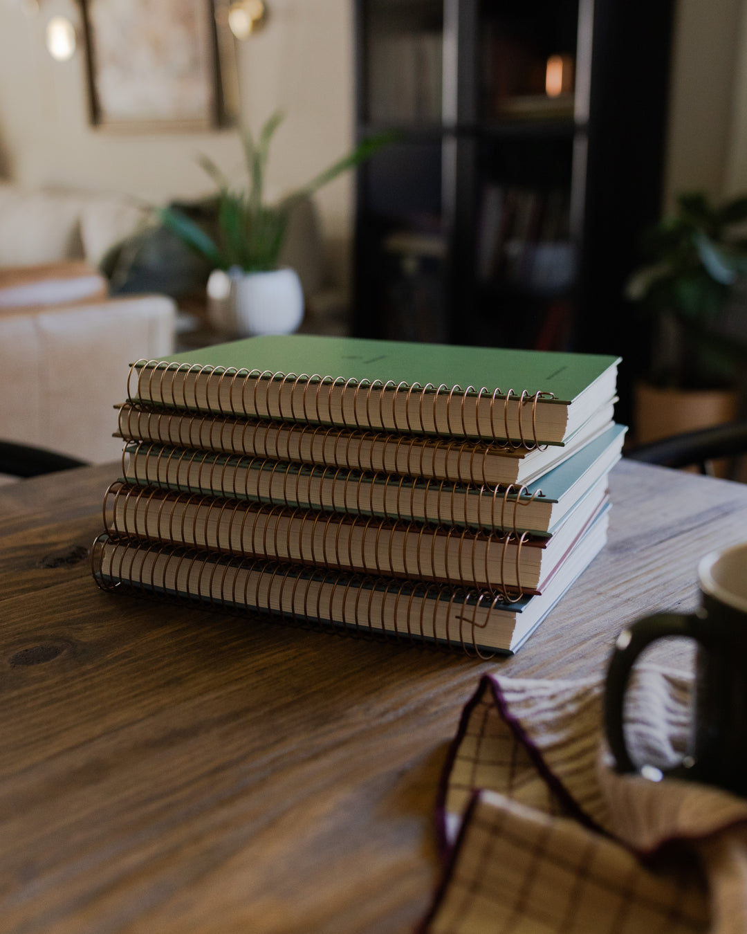 Stack of spiral Bibles sitting on a Table