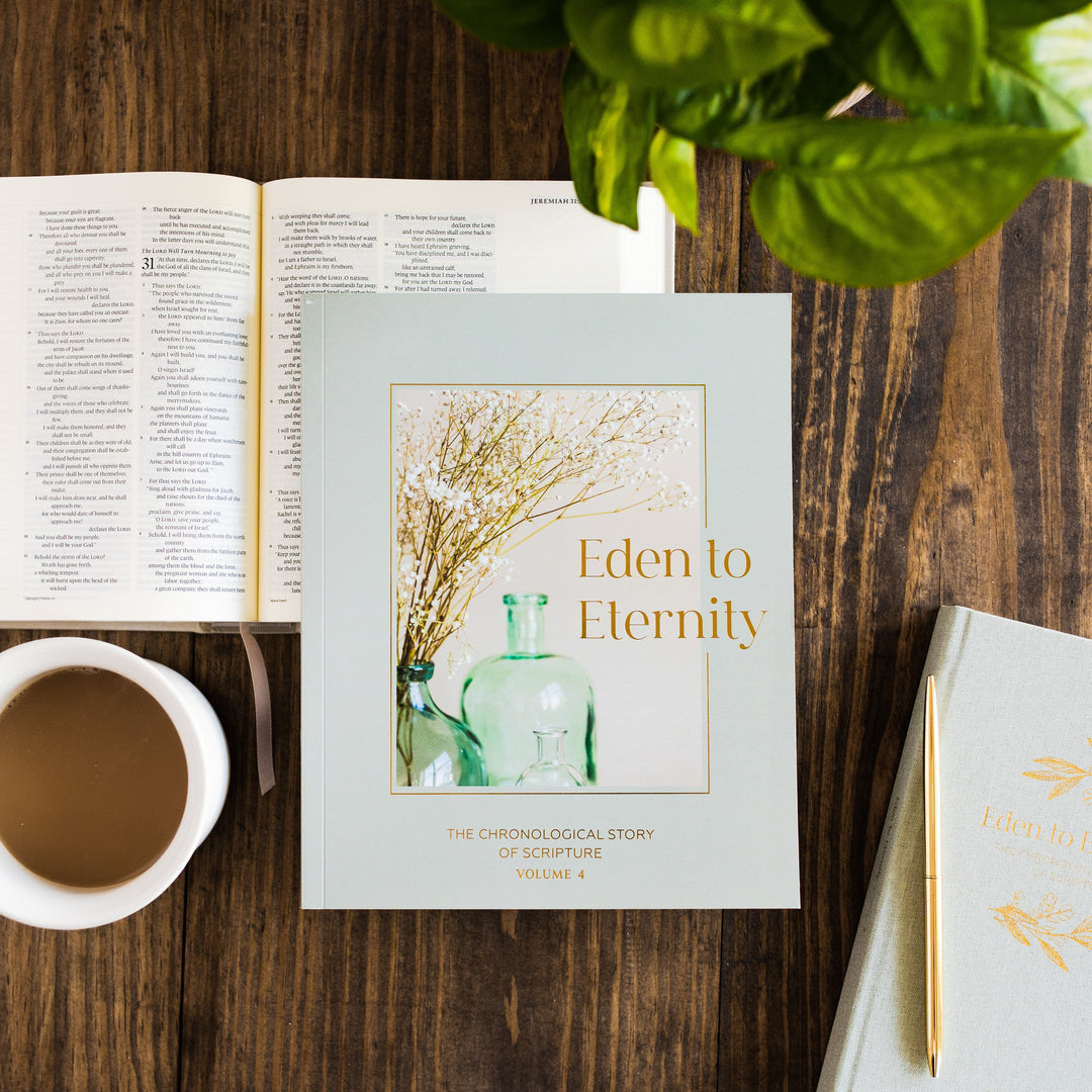 Eden to Eternity volume 4 on top of a Bible next to a journal and cup of coffee