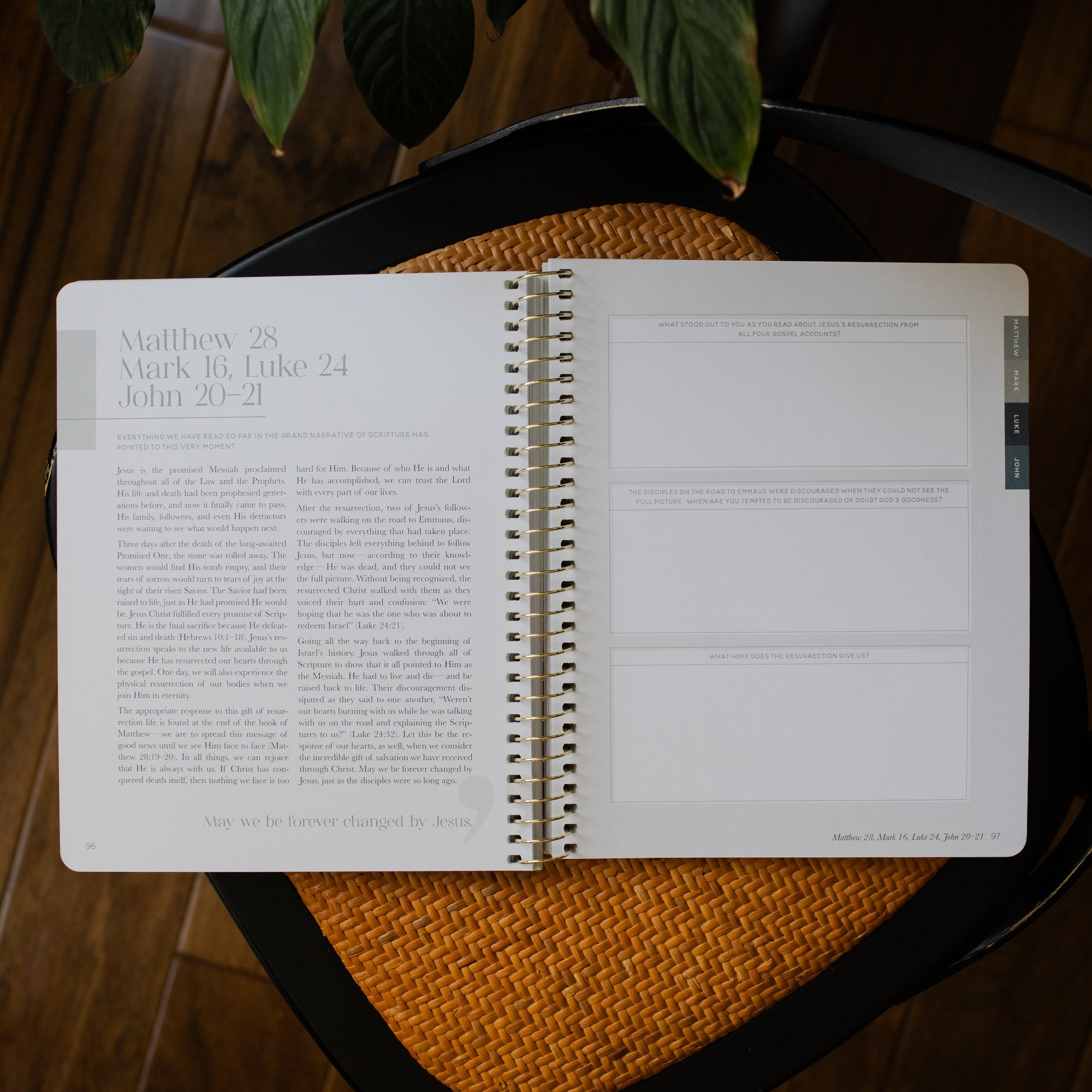 Eden to Eternity Volume 4 opened to Matthew, Mark, Luke, and John questions sections on a woven chair