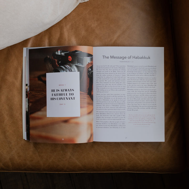 Even If Study opened to the Message of Habakkuk page on a leather couch